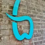 Bastien dental care logo